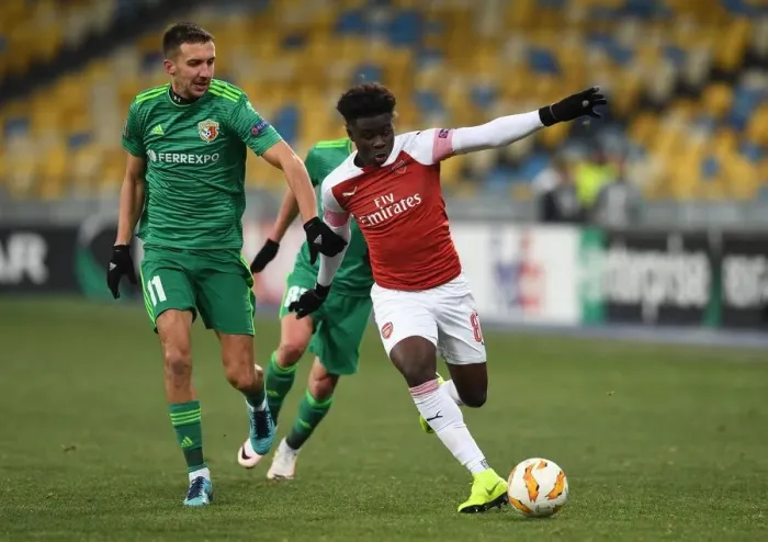 Framed Print : Bukayo Saka vs. Vyacheslav Sharpar: Arsenal's Rising Star Faces Off Against Vorskla Defender in Europa League Clash Framed Print : Bukayo Saka vs. Vyacheslav Sharpar: Arsenal's Rising Star Faces Off Against Vorskla Defender in Europa League Clash