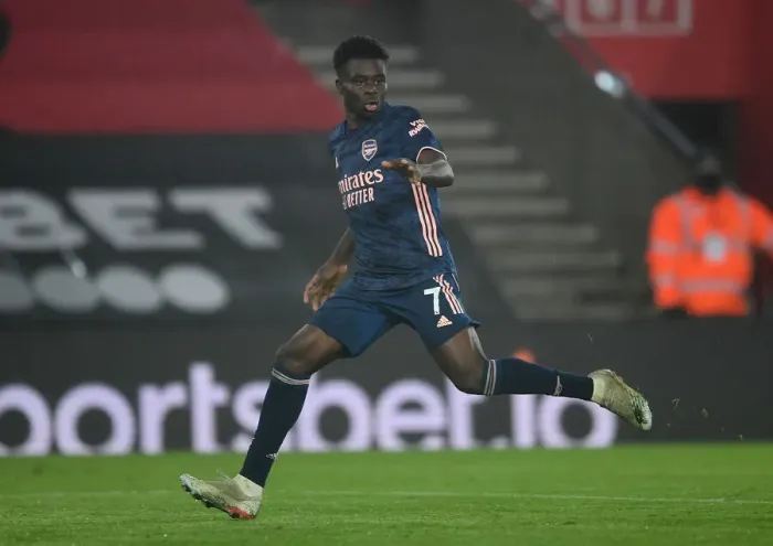 Framed Print : Bukayo Saka's Brilliant Performance at Empty Southampton Stadium - Arsenal's Premier League Victory 2020-21