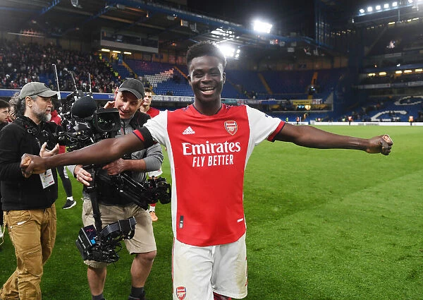Bukayo Saka's Euphoric Celebration: Arsenal's Thrilling Victory over Chelsea in the Premier League (2021-22)