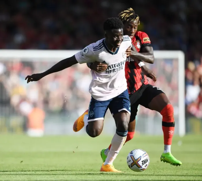 Framed Print : Bukayo Saka's Slick Moves: Outmaneuvering Jordan Zemura in AFC Bournemouth vs Arsenal FC, Premier League 2022-23
