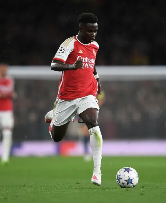 Framed Print : Bukayo Saka's Standout Display: Arsenal's Victory Over PSV Eindhoven in the Champions League