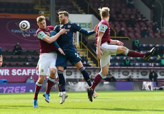 Framed Print : Burnley vs Arsenal: Calum Chambers Faces Off Against Chris Wood Amid Empty Turf Moor Framed Print : Burnley vs Arsenal: Calum Chambers Faces Off Against Chris Wood Amid Empty Turf Moor