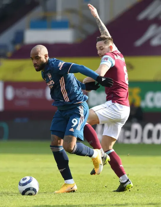 Framed Print : Burnley vs Arsenal: Lacazette Faces Brownhill in Empty Turf Moor, Premier League 2021 Framed Print : Burnley vs Arsenal: Lacazette Faces Brownhill in Empty Turf Moor, Premier League 2021