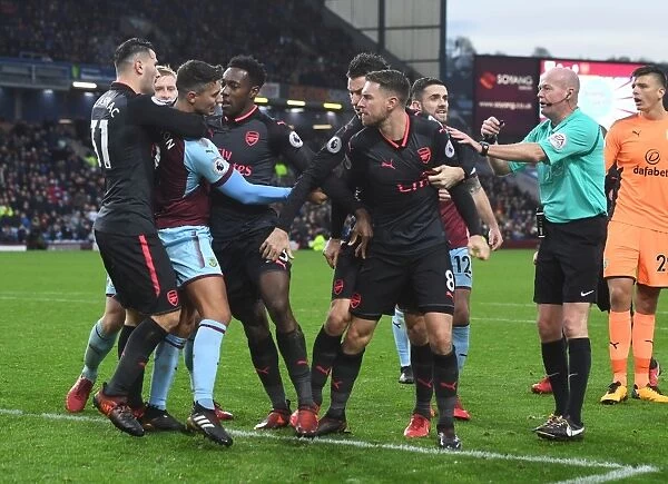 Burnley vs. Arsenal: Ramsey and Kolasinac Clash in Intense Premier League Match