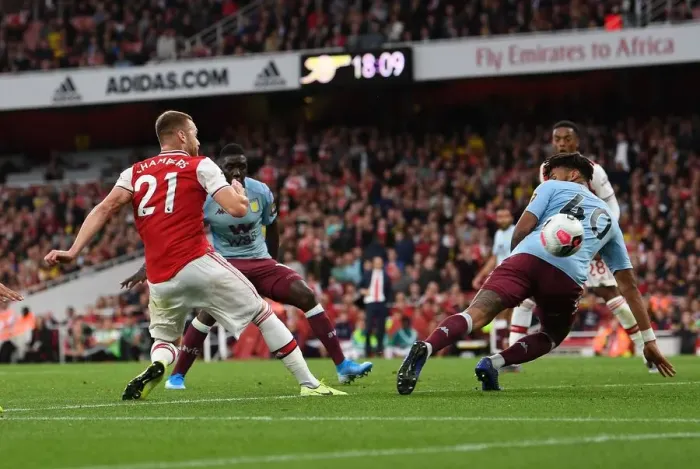 Framed Print : Calum Chambers Decisive Strike: Arsenal's Triumph over Aston Villa (2019-20 Premier League)