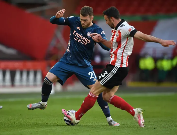 Framed Print : Calum Chambers vs. Enda Stevens: A Battle at Empty Bramall Lane - Arsenal vs. Sheffield United, Premier League 2020-21 Framed Print : Calum Chambers vs. Enda Stevens: A Battle at Empty Bramall Lane - Arsenal vs. Sheffield United, Premier League 2020-21