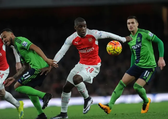 Framed Print : Campbell vs Tadic-Bertrand: Intense Battle between Arsenal's Joel Campbell and Southampton's Dusan Tadic and Ryan Bertrand in the Premier League Framed Print : Campbell vs Tadic-Bertrand: Intense Battle between Arsenal's Joel Campbell and Southampton's Dusan Tadic and Ryan Bertrand in the Premier League
