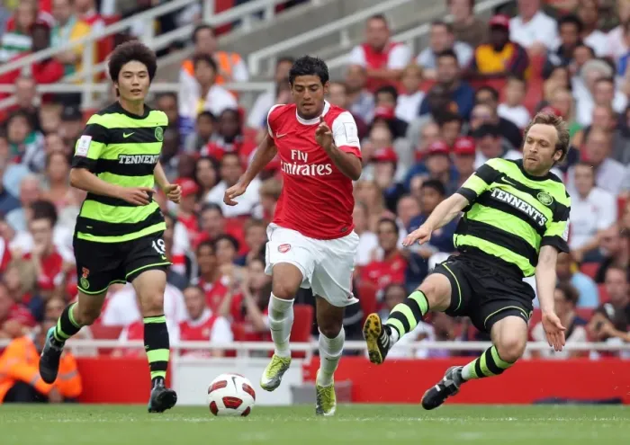Framed Print : Carlos Vela (Arsenal) Andreas Hinkel and Ki Sung-Yueng (Celtic). Arsenal 3: 2 Celtic