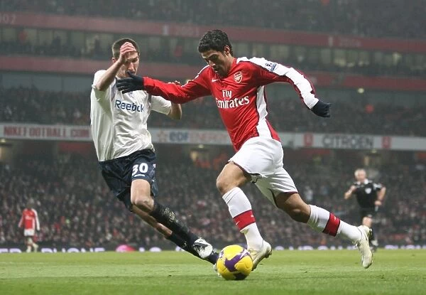 Carlos Vela (Arsenal) Chris Basham (Bolton)