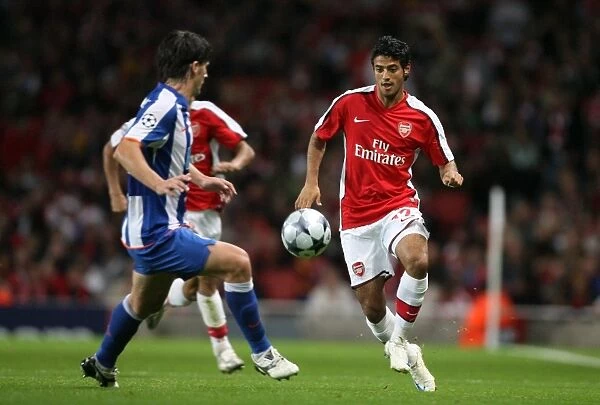 Carlos Vela (Arsenal) Cristian Sapunaru (Porto)