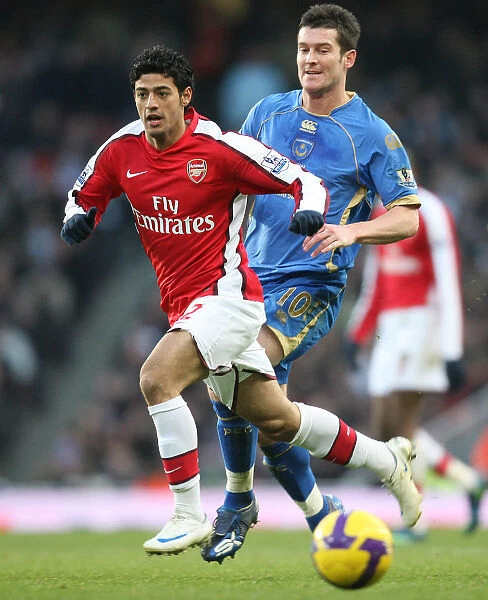Carlos Vela (Arsenal) David Nugent (Portsmouth)