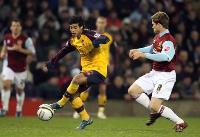 Framed Print : Carlos Vela (Arsenal) Joey Gudjonsson (Burnley) Framed Print : Carlos Vela (Arsenal) Joey Gudjonsson (Burnley)