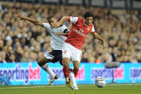 Carlos Vela (Arsenal) Kyle Naughton (Tottenham). Tottenham Hotspur 1:4 Arsenal (aet)
