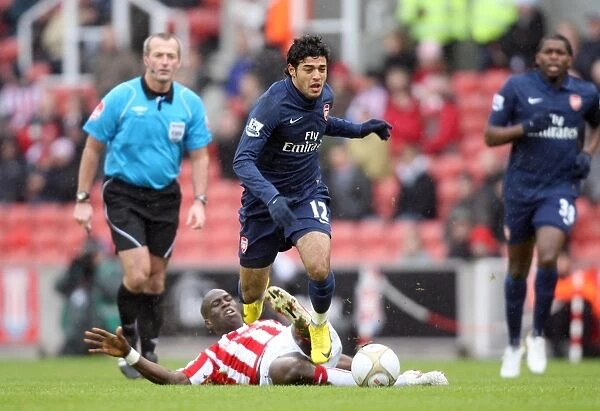 Carlos Vela (Arsenal) Mamady Sidibe (Stoke). Stoke City 3: 1 Arsenal. FA Cup 4th Round