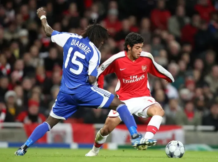 Framed Print : Carlos Vela (Arsenal) Pape Diakhate (Kiev) Framed Print : Carlos Vela (Arsenal) Pape Diakhate (Kiev)