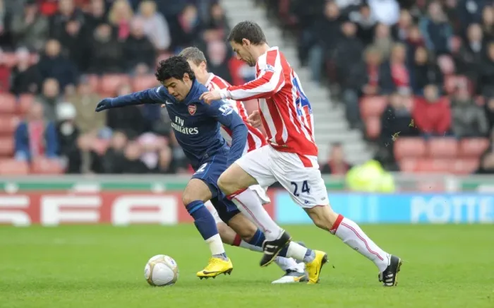 Framed Print : Carlos Vela (Arsenal) Rory Delap and Robert Huth (Stoke). Stoke City 3: 1 Arsenal