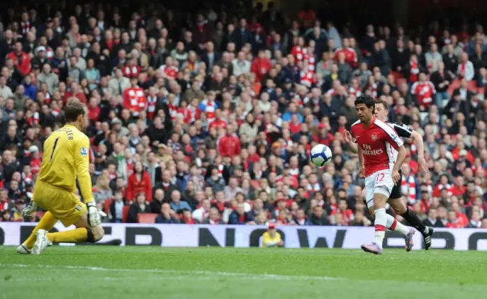 Framed Print : Carlos Vela chips the ball over Fulham goalkeeper Mark Schwarzer to score the 4th Arsenal goal Framed Print : Carlos Vela chips the ball over Fulham goalkeeper Mark Schwarzer to score the 4th Arsenal goal