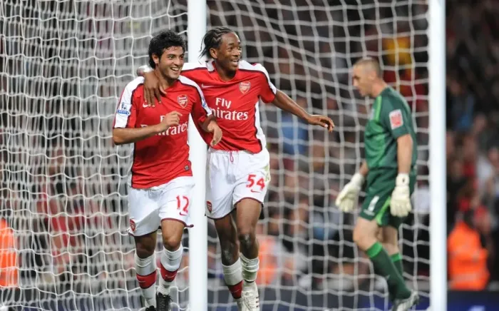 Framed Print : Carlos Vela and Sanchez Watt: Celebrating Arsenal's 2-0 Goals Against West Brom in Carling Cup Framed Print : Carlos Vela and Sanchez Watt: Celebrating Arsenal's 2-0 Goals Against West Brom in Carling Cup