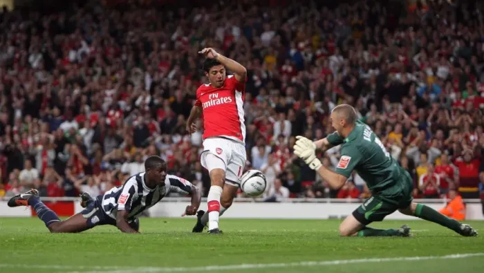 Framed Print : Carlos Vela scores Arsenals 2nd goal past Dean Kiely