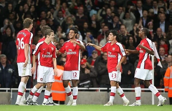 Carlos Vela shoots celebrates scoring the 3rd Arsenal