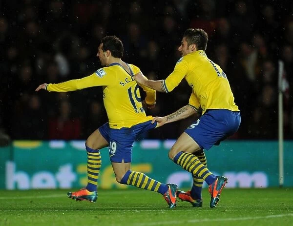 Cazorla and Giroud Celebrate Arsenal's Winning Goals Against Southampton (2013-14)