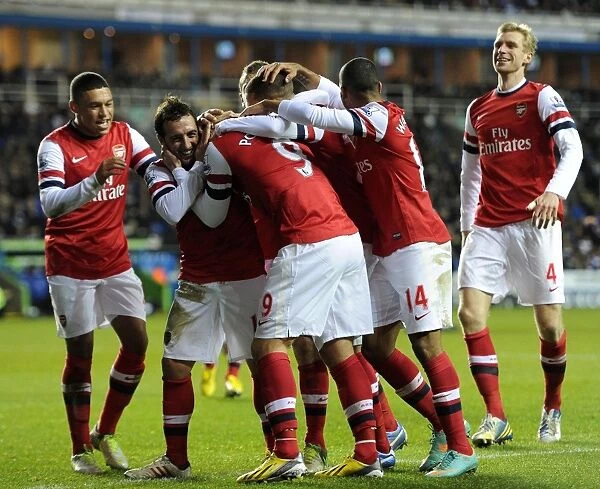 Cazorla and Podolski Celebrate Goals: Reading vs. Arsenal (2012-13)