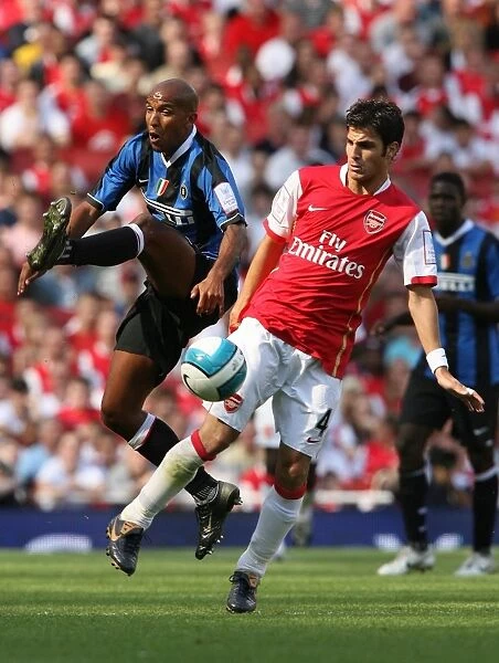 Cecs Fabregas (Arsenal) Olivier Dacourt (Inter)