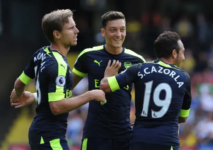 Framed Print : Celebrating Arsenal's First Goal: Cazorla, Monreal, Ozil (Watford vs. Arsenal, 2016-17)