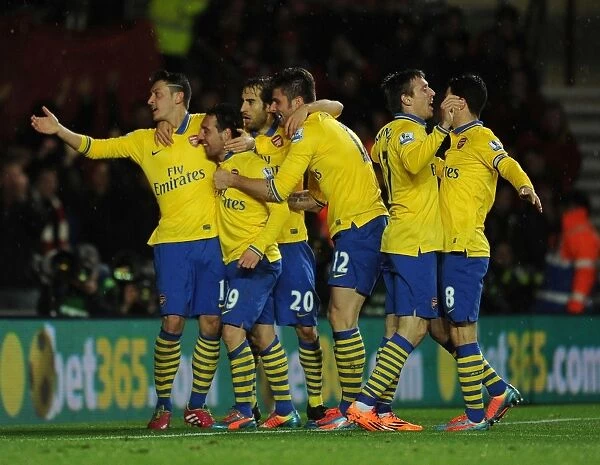 Celebrating Glory: Cazorla, Giroud, Ozil, and Flamini's Unforgettable Moment at Southampton (Arsenal's 2013-14 Premier League Victory)