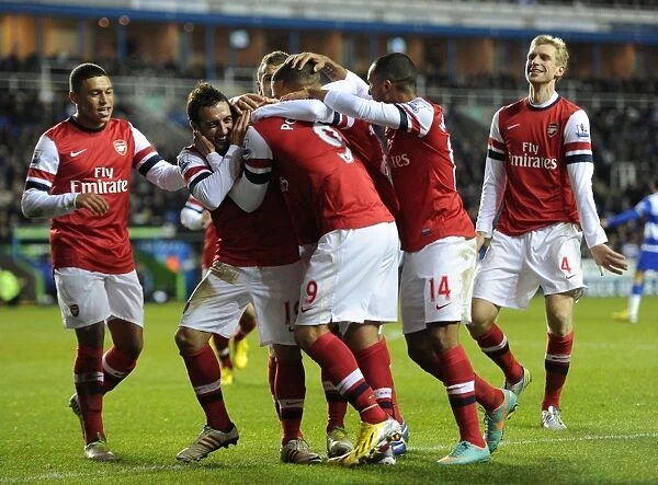 Celebrating Glory: Cazorla and Podolski's Euphoric Dance after Arsenal's Thrilling Victory at Reading (2012-13)