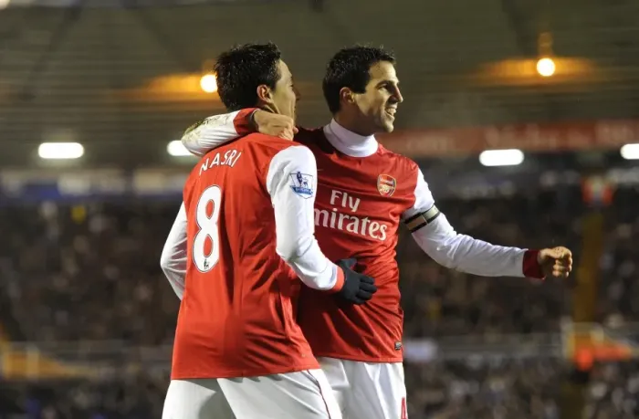 Framed Print : Celebrating Glory: Fabregas and Nasri's Unforgettable Moment as Arsenal Scores the Third Goal Against Birmingham City (1-3), Barclays Premier League, 2011 Framed Print : Celebrating Glory: Fabregas and Nasri's Unforgettable Moment as Arsenal Scores the Third Goal Against Birmingham City (1-3), Barclays Premier League, 2011