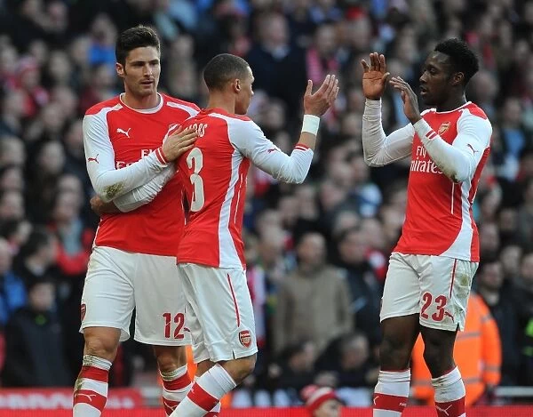 Celebrating Glory: Giroud, Gibbs, and Welbeck Rejoice in Arsenal's 2-0 FA Cup Victory