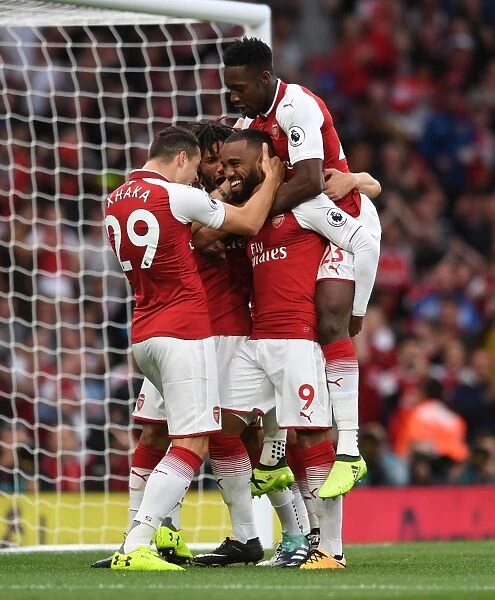 Celebrating Glory: Lacazette, Xhaka, and Welbeck's Triumphant Dance (Arsenal vs Leicester City, 2017-18)