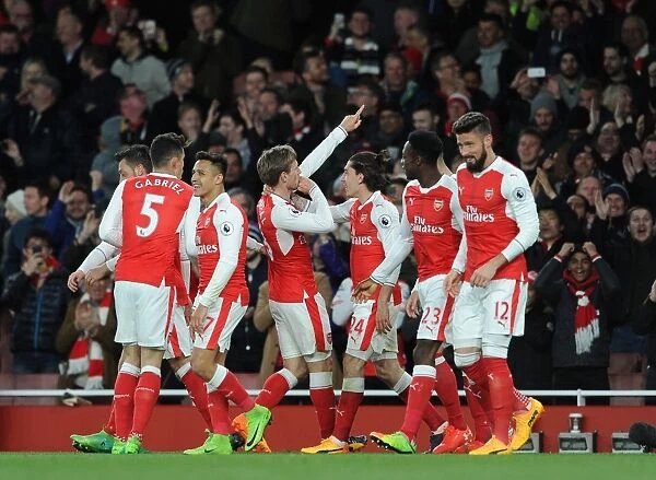 Celebrating a Goal: Arsenal's Nacho Monreal and Team Mates