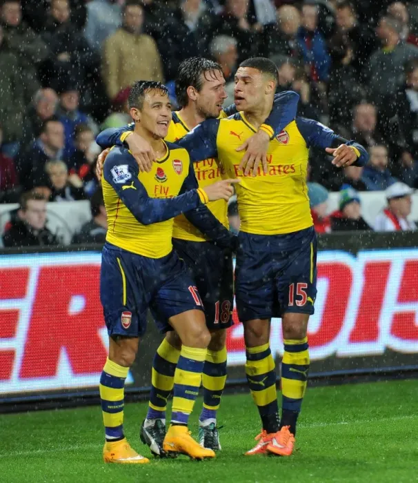 Framed Print : Celebrating a Goal: Sanchez, Oxlade-Chamberlain, and Monreal (Swansea vs Arsenal, 2014-15) Framed Print : Celebrating a Goal: Sanchez, Oxlade-Chamberlain, and Monreal (Swansea vs Arsenal, 2014-15)