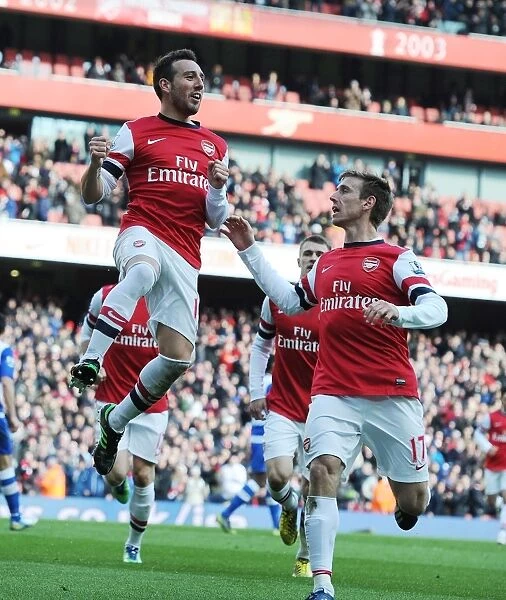 Celebrating a Goal: Santi Cazorla and Nacho Monreal, Arsenal vs. Reading, Premier League, 2013