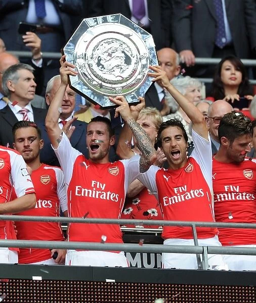 Celebrating Victory: Debuchy and Flamini, Arsenal's FA Community Shield Champions (2014 / 15)