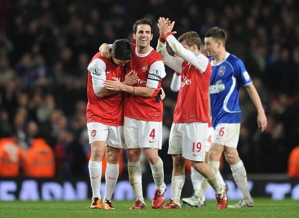 Celebrating Victory: Fabregas and Nasri's Unforgettable Moment as Arsenal Advance to Carling Cup Final (3:0 vs Ipswich Town)