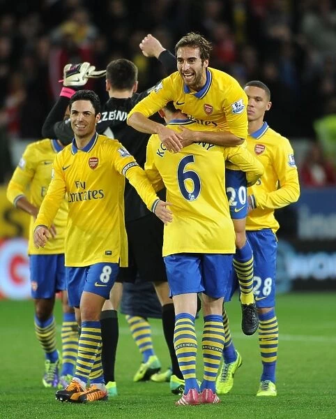Celebrating Victory: Flamini, Koscielny, and Arteta (Cardiff City vs. Arsenal, 2013-14)