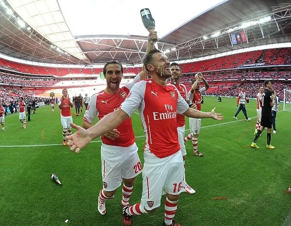 Celebrating Victory: Flamini and Ramsey of Arsenal