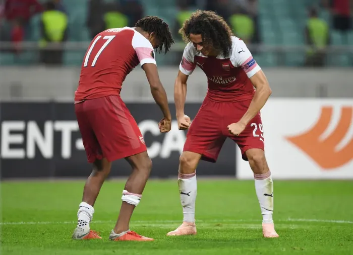 Framed Print : Celebrating Victory: Iwobi and Guendouzi Rejoice After Arsenal's UEFA Europa League Win Against Qarabag Framed Print : Celebrating Victory: Iwobi and Guendouzi Rejoice After Arsenal's UEFA Europa League Win Against Qarabag