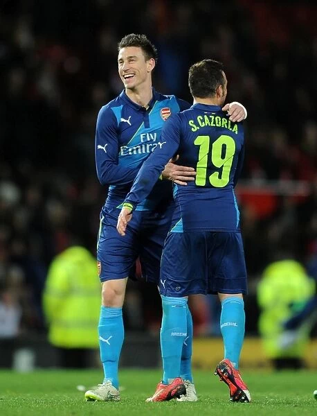 Celebrating Victory: Koscielny and Cazorla Rejoice After Arsenal's FA Cup Win vs Manchester United
