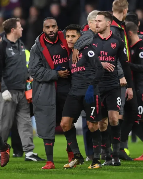 Framed Print : Celebrating Victory: Lacazette and Sanchez's Jubilant Moment after Arsenal's Win against Burnley Framed Print : Celebrating Victory: Lacazette and Sanchez's Jubilant Moment after Arsenal's Win against Burnley