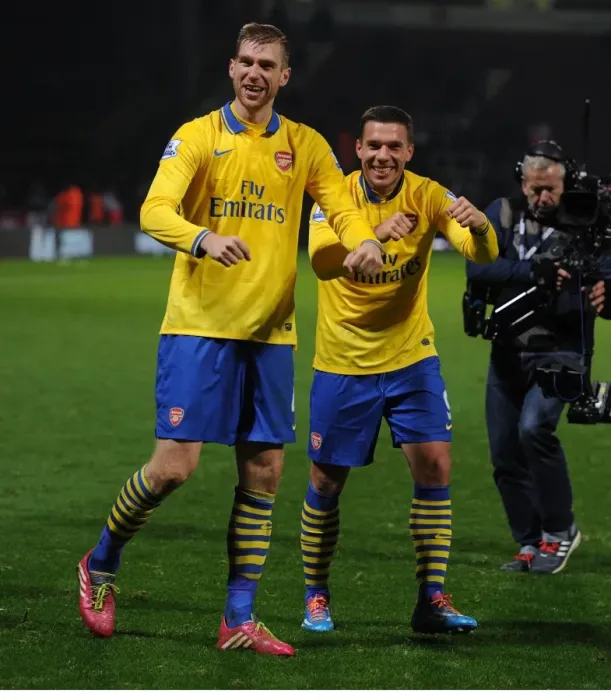 Framed Print : Celebrating Victory: Per Mertesacker and Lukas Podolski, Arsenal Football Club Framed Print : Celebrating Victory: Per Mertesacker and Lukas Podolski, Arsenal Football Club