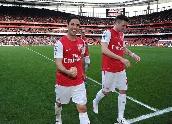 Celebrating Victory: Mikel Arteta and Carl Jenkinson, Arsenal FC