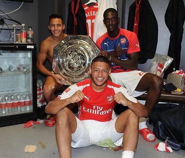 Celebrating Victory: Sanchez, Oxlade-Chamberlain, and Sanogo of Arsenal