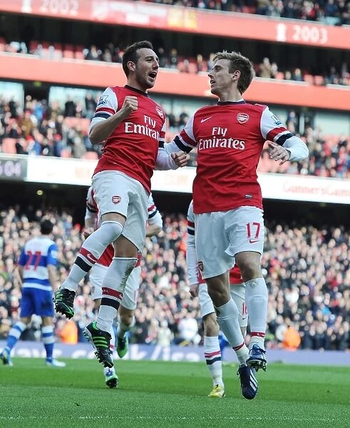 Celebrating Victory: Santi Cazorla and Nacho Monreal's Unforgettable Moment at Arsenal vs. Reading (2013)
