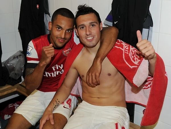 Celebrating Victory: Theo Walcott and Santi Cazorla of Arsenal