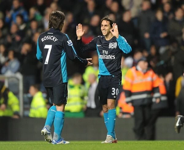 Celebrating Victory: Yossi Benayoun and Tomas Rosicky's Unforgettable Moment at Aston Villa (2011-12)