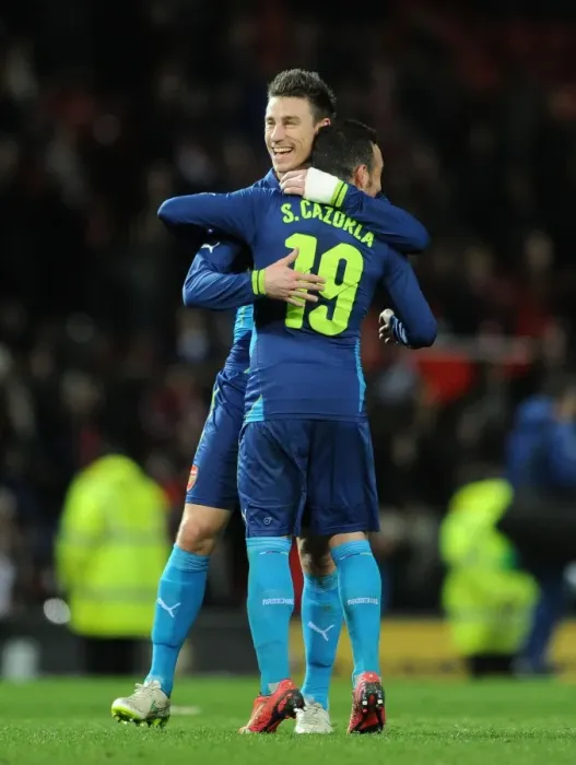 Framed Print : Celebration at Old Trafford: Koscielny and Cazorla Rejoice After Arsenal's FA Cup Victory Over Manchester United